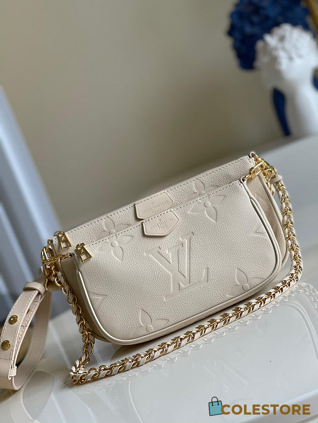 Louis Vuitton Accessoires Cuir Monogram Empreinte Beige 24cm - 1