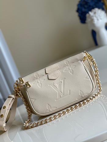Louis Vuitton Accessoires Cuir Monogram Empreinte Beige 24cm