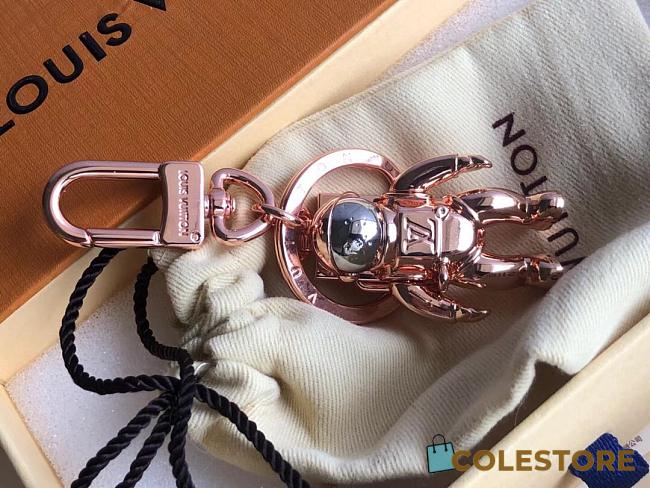 Louis Vuitton Space Man Key Chain  - 1