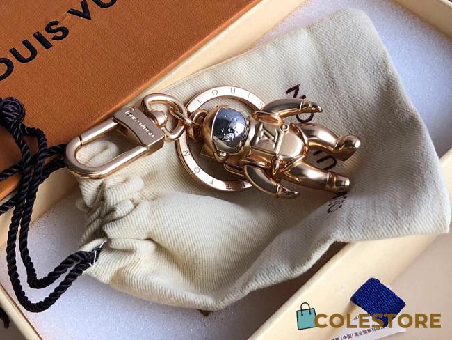 Louis Vuitton Golden Space Man Key Chain  - 1
