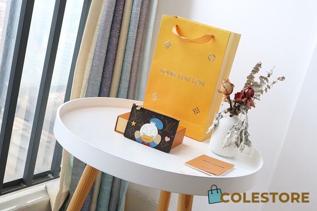 Louis Vuitton Cute Donald Duck Coin Card In Brown - 1