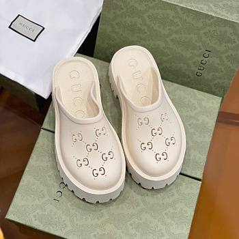 Gucci Women's platform perforated G sandal