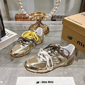 Colestore New Balance X Miu Miu 530 SL leather sneakers Gold