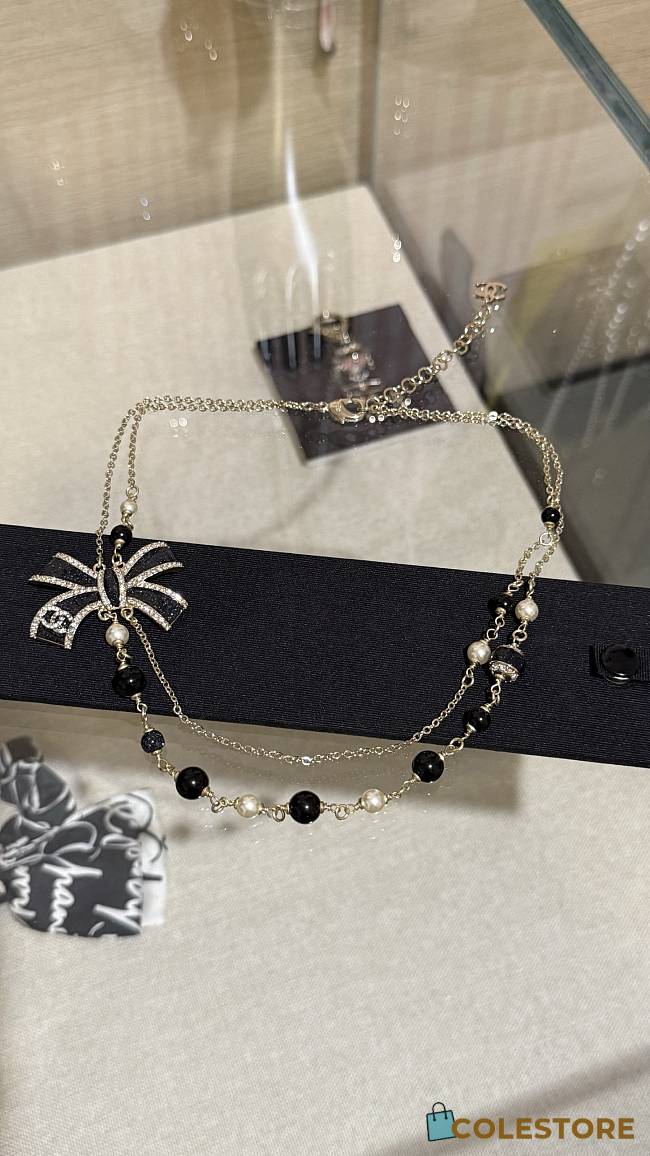 Colestore Chanel Long Necklace Metal, Glass Pearls, Resin & strass  Gold, Pearly White, Black & Crystal - 1