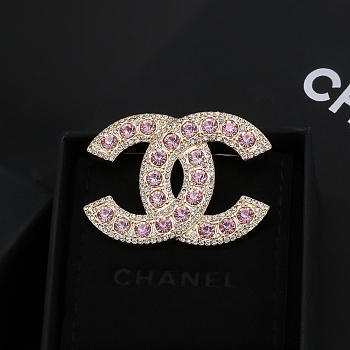 Colestore Chanel Black Letter Brooch – Classic & Elegant Design