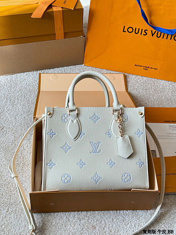 Colestore  Louis Vuitton OnTheGo PM Monogram Empreinte Leather Light Blue 25 x 19 x 11.5 cm