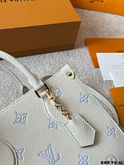 Colestore  Louis Vuitton OnTheGo PM Monogram Empreinte Leather Light Blue 25 x 19 x 11.5 cm - 4