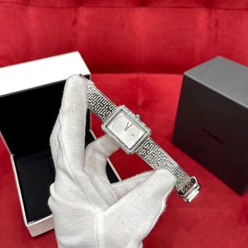 Colestore Chanel Boy-Friend Tweed Watch featuring a silver-tone strap and case