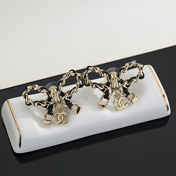 Colestore Chanel Goldtone Metal and Leather CC Bow Earrings